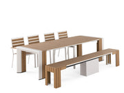 Transformer Table outdoor dining set with expandable table and matching chairs in an outdoor setting
