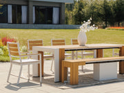 Transformer Table outdoor dining set with expandable table and matching benches in a modern outdoor setting
