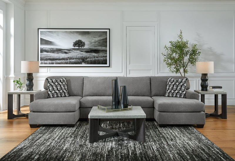 Ashley Furniture Birkdale Court sectional sofa with plush cushions and neutral upholstery, shown in a modern living room setting.