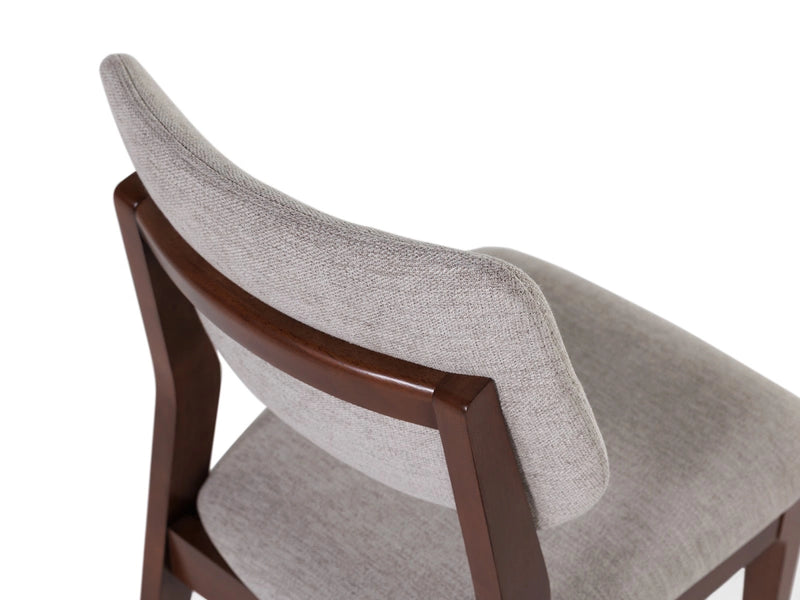 Transformer Table Eclipse dining chair in a sleek, modern design with curved backrest and upholstered seat