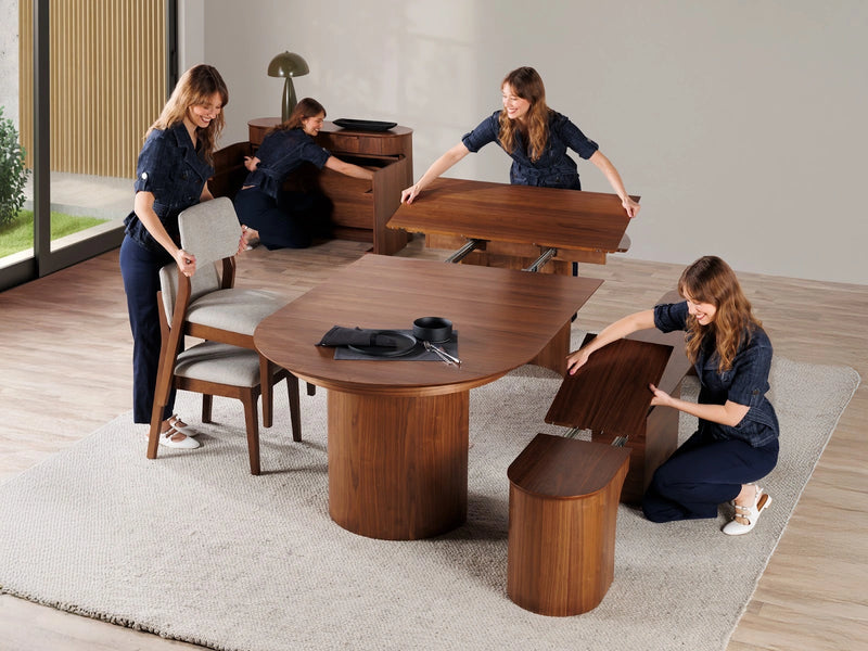 Transformer Table Eclipse dining table in a modern expandable design, shown in a warm wood finish
