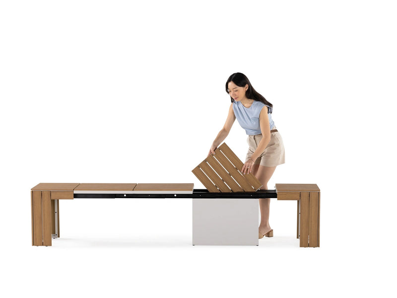 Transformer Table outdoor bench in a modern design, shown from a side angle