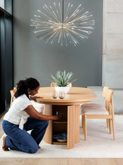 Transformer Table round dining table in a contemporary wood finish