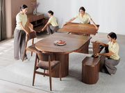 Transformer Table round dining table in a modern wood finish, shown as a compact dining table setup