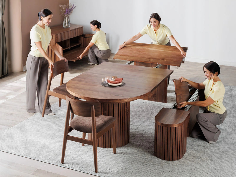 Transformer Table round dining table in a modern wood finish, shown as a compact dining table setup