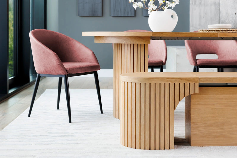 Transformer Table round dining table in a modern wood finish, shown with a compact design