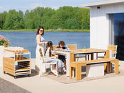 Transformer Table outdoor dining set with extendable table and matching chairs on a patio