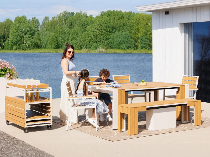 Transformer Table outdoor dining set with extendable table and matching chairs on a patio