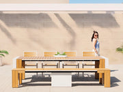 Transformer Table outdoor dining set with expandable table and matching seating in an outdoor setting