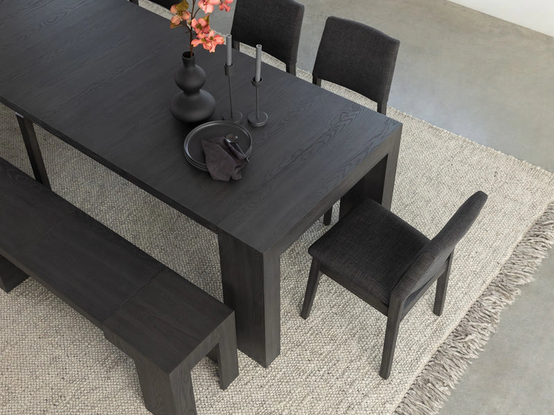 Transformer Table dining set with expandable table and coordinating dining chairs.