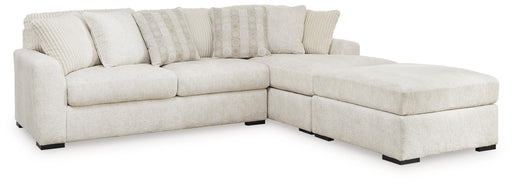 Ashley Furniture Chessington living room set featuring a sofa and loveseat with neutral fabric and modern design.