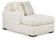 Ashley Furniture Chessington sectional with double chaise, shown from an angled view highlighting its modern design and plush upholstery.