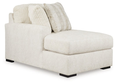 Ashley Furniture Chessington sectional with double chaise, shown from an angled view highlighting its modern design and plush upholstery.