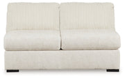 Ashley Furniture Chessington sectional with double chaise, featuring plush upholstery and modern design, shown head-on from the front.