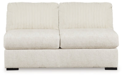 Ashley Furniture Chessington sectional with double chaise, featuring plush upholstery and modern design, shown head-on from the front.