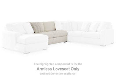 Ashley Furniture Chessington sectional with double chaise, showcasing plush fabric, spacious seating, and modern design.