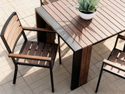 Transformer Table outdoor dining chair with a modern design in a neutral finish