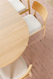 Transformer Table round dining chair in a modern upholstered design