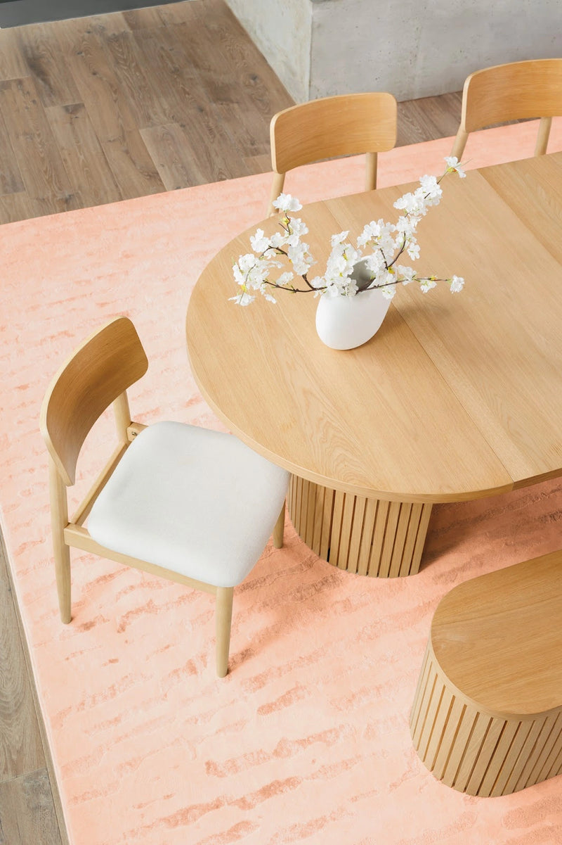 Transformer Table round dining table in wood finish.