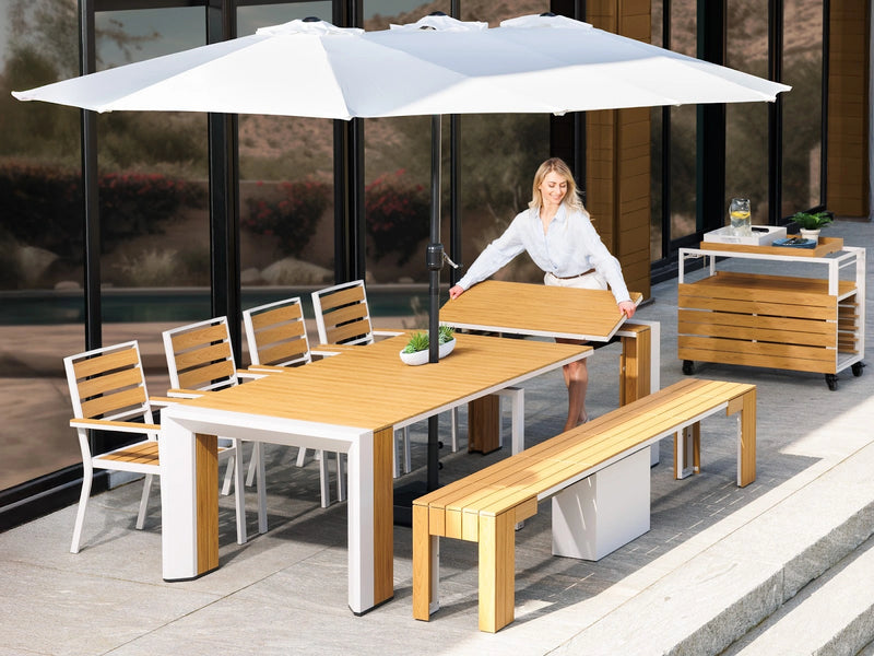 Transformer Table outdoor dining set with expandable table and matching chairs on a patio