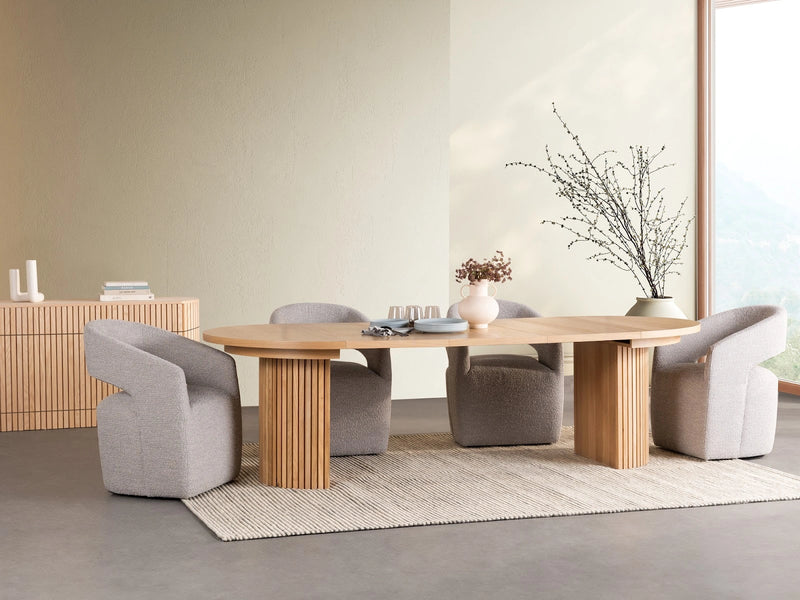 Transformer Table Round Dining Table by Transformer Table, expandable modern wood table shown against a neutral background