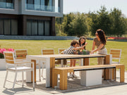 Transformer Table outdoor dining set with expandable dining table and matching benches in a patio setting