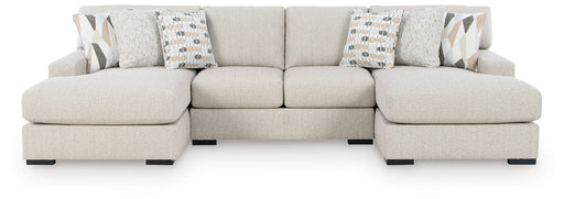 Ashley Furniture Laurelgrove double chaise sectional with plush fabric, featuring multiple seating areas and a modern design.