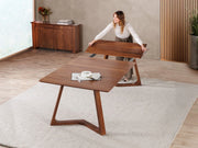 Transformer Table Nova dining table in a modern finish, shown as a sleek expandable table for dining spaces