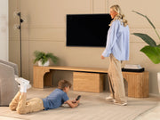 Transformer Table round bench in a minimalist wood design with a curved seat and sturdy legs