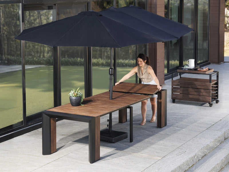Transformer Table outdoor dining table by Transformer Table shown in an extended configuration