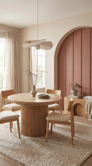 Transformer Table round dining set with a round table and matching chairs in a modern dining room