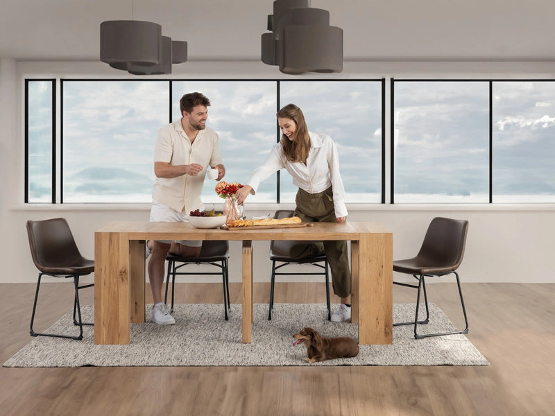 Transformer Table dining table shown in an extended configuration with a modern wood finish