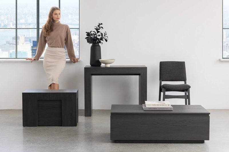 Transformer Table dining table shown in its compact configuration with a modern wood finish