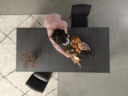 Transformer Table dining table in a modern expandable design, shown in a neutral finish