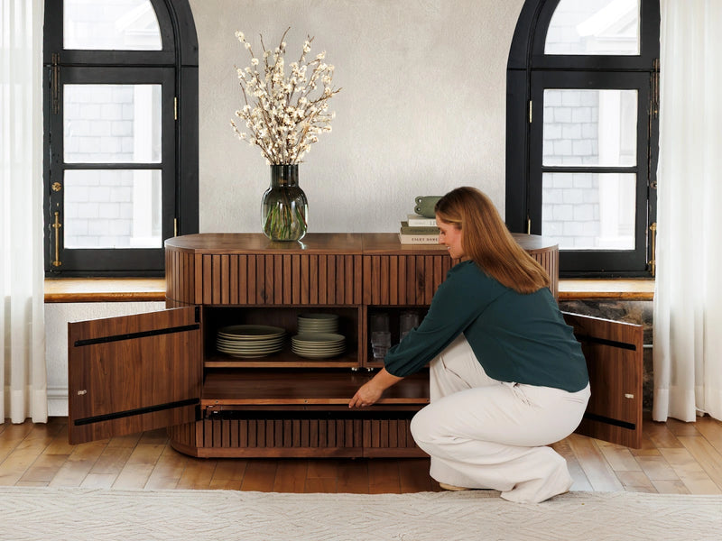 Transformer Table round sideboard buffet in a modern design, shown closed with a smooth tabletop and storage base