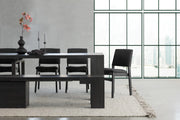 Transformer Table dining set with expandable table and matching chairs in a modern dining room