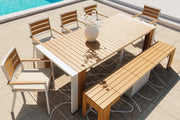 Transformer Table outdoor dining set with expandable table and matching benches on a patio
