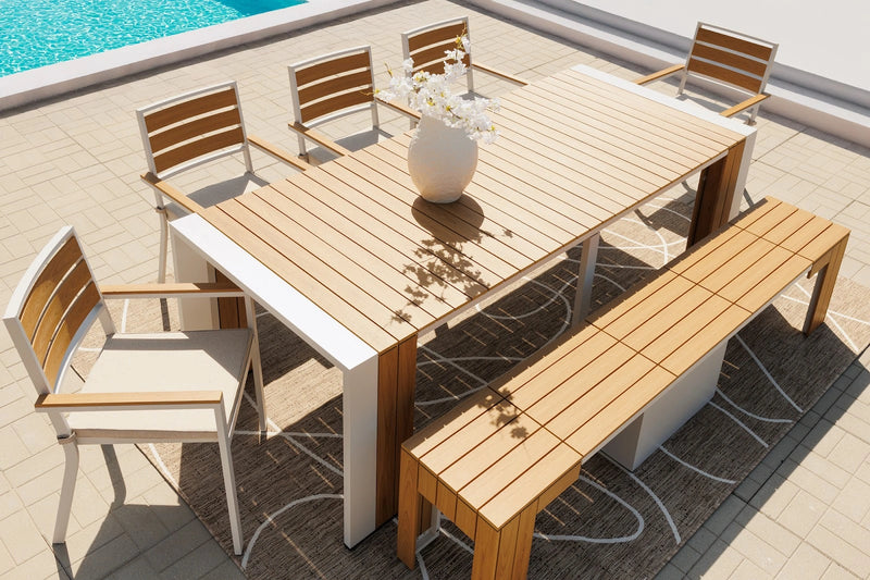 Transformer Table outdoor dining set with expandable table and matching benches on a patio