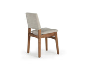 Transformer Table Transformer Chair dining chair with a modern design and upholstered seat.