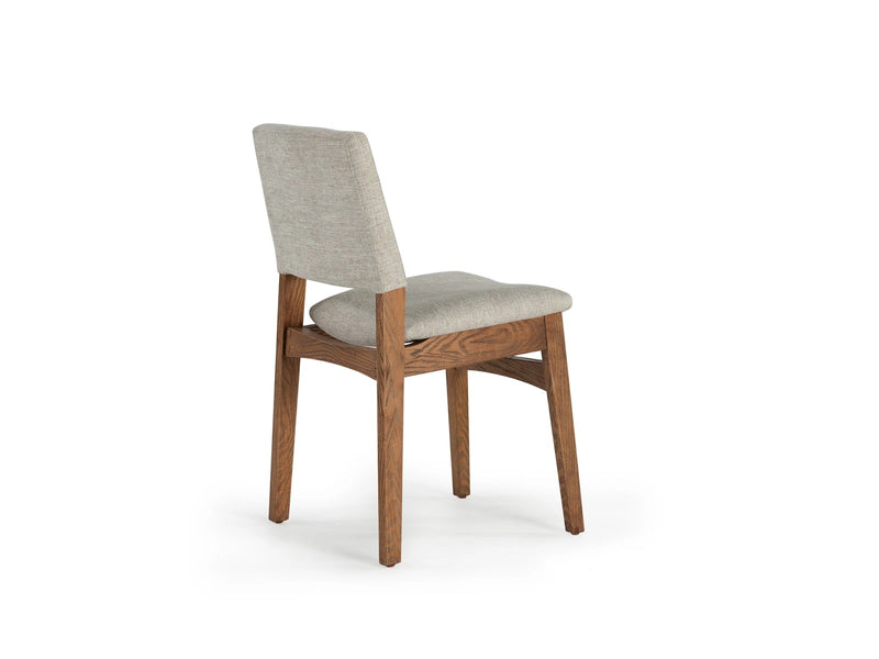 Transformer Table Transformer Chair dining chair with a modern design and upholstered seat.
