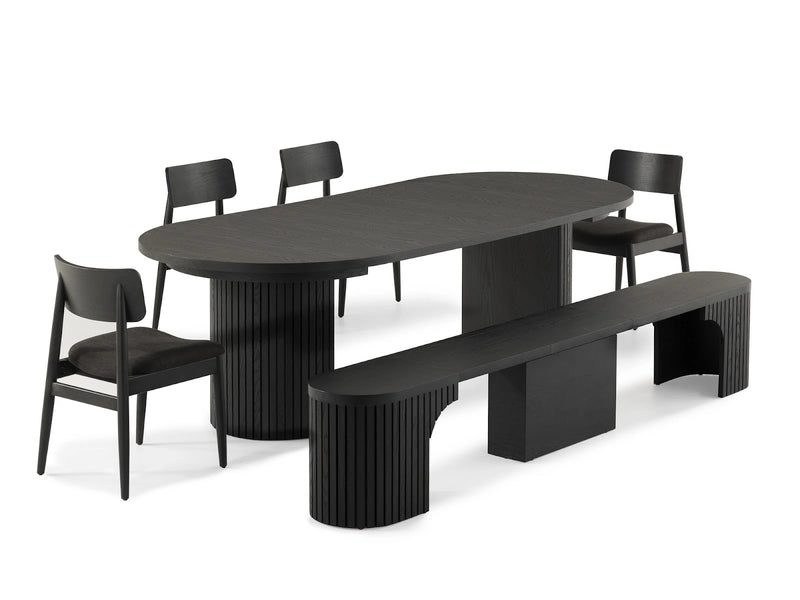 Transformer Table round dining set with expandable round table and matching chairs in a dining room
