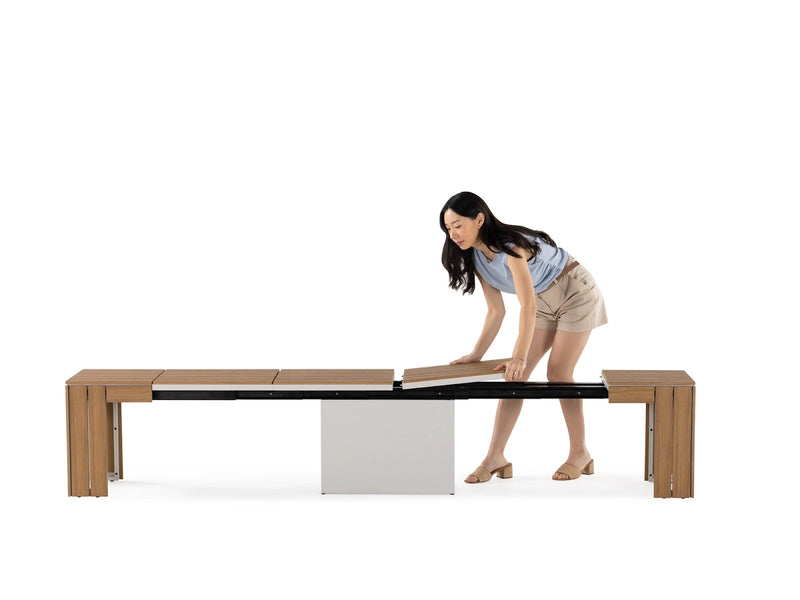 Transformer Table outdoor bench by Transformer Table, shown in a minimalist design for outdoor seating