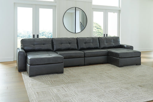 Ashley Furniture Brindley Pier living room set featuring a sofa and matching chairs with plush cushions and elegant upholstery.
