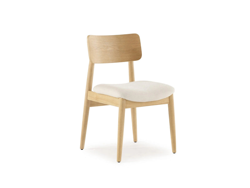 Transformer Table round dining chair in a modern design, shown from the side.