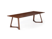 Transformer Table Nova dining table in a modern wood finish, shown extended for additional seating