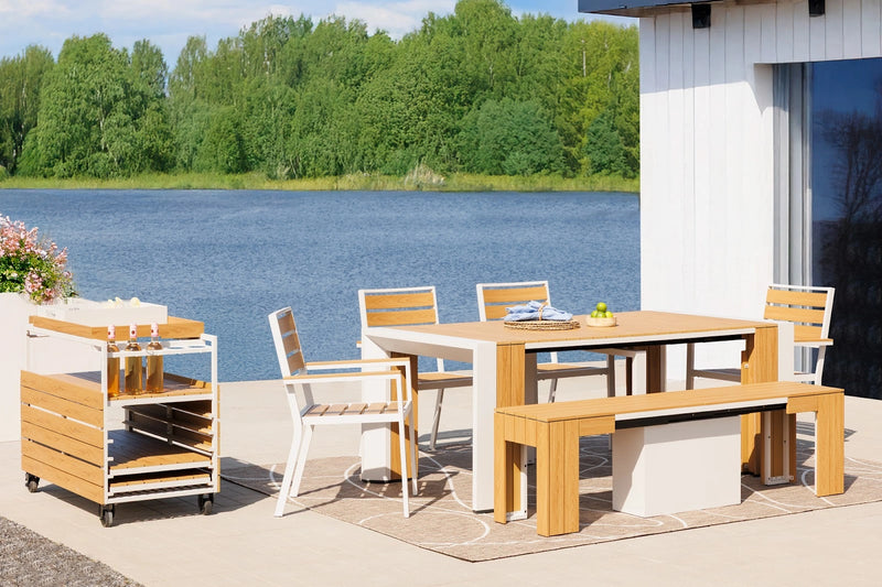 Transformer Table outdoor dining set with expandable table and matching chairs on a patio