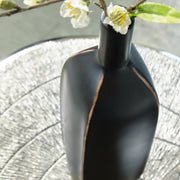 Ashley Furniture Rhaveney Vase, detailed close-up showing textured ceramic surface and elegant shape.