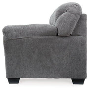Ashley Furniture Allmaxx sofa with plush cushions and modern design, shown in a stylish living room setting.