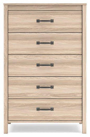 Ashley Furniture Battelle chest of drawers showing a modern wooden chest with multiple drawers and sleek handles.