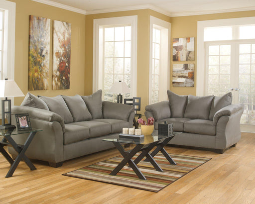 Ashley Furniture Darcy living room set featuring a sofa and armchair with modern upholstery and stylish design.